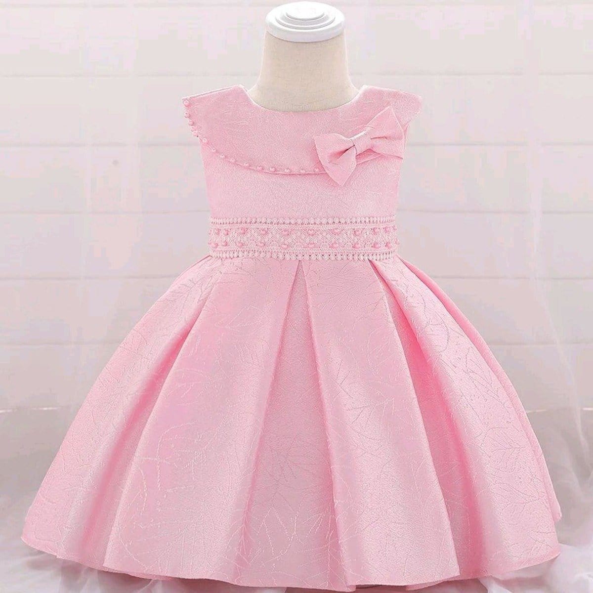 robe bébé rose pastel